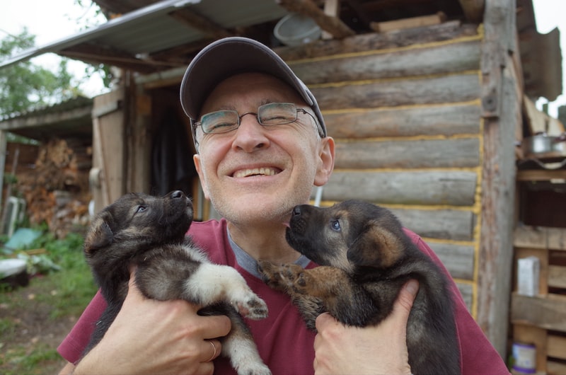 A person holding an animal